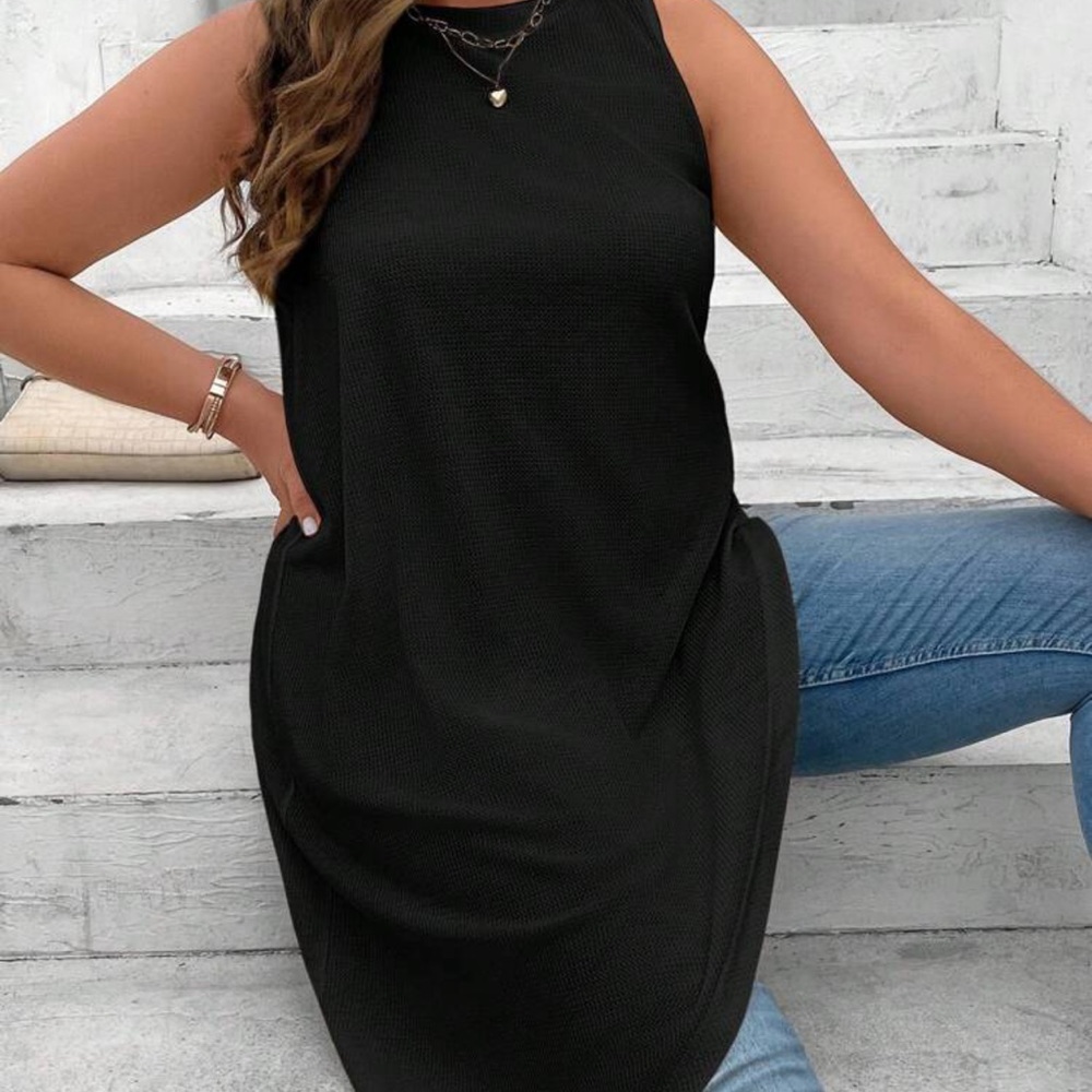 Asymmetrical sleeveless top